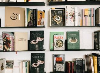 Bookshelf with various non-fiction titles